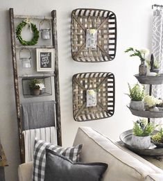 Add decor and hang a wreath on a wooden ladder to add style to your blanket ladder! #farmhousedecor #diyladder #blanketladder #ladderdecor Ladder On Wall Decor, Ladder On Wall, Ladder Decor Ideas, Blanket Ladder Ideas, Blanket Ladder Decor, Tall Wall Decor, Wooden Blanket Ladder, Crazy Weather, Vintage Ladder