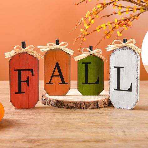 PRICES MAY VARY. Fall Decorations: Add a touch of autumn charm to your home with this 4pcs wood sign pumpkin block set. Perfect for fall decor or Thanksgiving decor, these pumpkins feature the letters "FALL" for a unique and festive look. Eye-catching Design: The wooden signs are carefully polished and painted, ensuring bright and eye-catching colors, adding a rustic charm to your fall décor. They are well-polished and can easily easily stand freely on any table or surface. Quality Material - Ma Fall Pumpkin Decorations, Fall Decor Signs, Harvest Kitchen, Fall Wood Crafts, Halloween Wood Signs, Fall Wood Signs, Pumpkin Decorations, Fall Table Centerpieces, Block Table