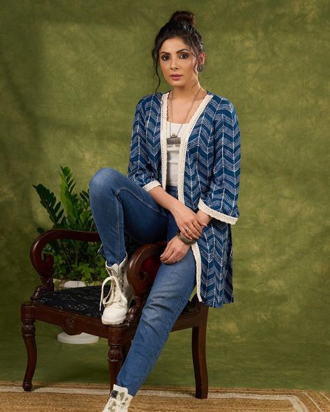 Elevate your wardrobe with our Boho Chic Indigo Blue Shrug. Featuring a vibrant print and whimsical laces, this piece will add a touch of bohemian flair to any outfit. Made with high quality materials, this shrug is both stylish and comfortable. Perfect for those looking for a unique and trendy piece to complete their look. #sujatra #sujatraglobal #sujatrajackets #bohochic #indigoblue #cottonshrugs #longshrug #cottonjacket #lace Blue Shrug, Long Shrug, Cotton Jacket, Indigo Blue, Boho Chic, Wardrobe, Lace, High Quality, Blue