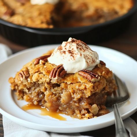 Warm pumpkin pecan cobbler with a gooey center and crisp topping. The perfect fall dessert with rich pumpkin flavor and crunchy pecans. Pumpkin Pecan Crisp, Pecan Crisp, Pecan Cobbler Recipe, Pumpkin Pecan Cobbler, Pineapple Dream Dessert, Crisp Topping, Pumpkin Crisp, Pecan Cobbler, Warm Desserts