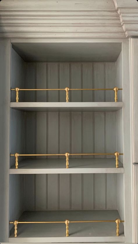 Olive Built Ins, Gallery Rail Kitchen Shelf, Brass Gallery Rail Kitchen, Brass Rod Shelving, Shelf With Gold Rail, Wet Bar In Kitchen, Bar With Open Shelving, Brass Bar Shelves, Shelves On Side Of Kitchen Cabinet