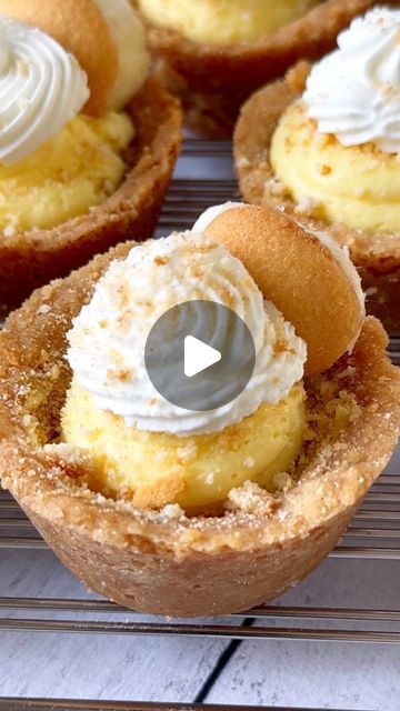 Theresa Marie Krunev on Instagram: "Banana Pudding Cookie Cups🍌😋  These banana pudding cookie cups are absolutely delicious! They only take 12 minutes to bake. These are a must save for spring baking. Full recipe in caption!   Printable recipe: https://sweetmonkey.blog/banana-pudding-cups/  Ingredients:  Cookie Cup: * 2 cups crushed Vanilla Wafers  * 2 cups crushed Golden Oreos  * 12 tbsp unsalted butter, melted  Filling:  * 2 bananas, sliced (set aside in a bowl) * 2, 3.4oz boxes instant pudding (1 Vanilla + 1 Banana cream) * 2 cups milk * 14 oz. Can Sweetened condensed milk * 2 cups heavy cream  * 1/4 cup powder sugar  Instructions: 1. Preheat oven to 350 degrees F. Grease a 12 cup muffin pan.  2. Combine crushed golden oreos and crushed vanilla wafers. Set aside 1/4 cup to sprinkle on Cookie Banana Pudding, Instagram Desserts, Banana Pudding Cookies, Cookie Cups Recipe, Sliced Banana, Best Banana Pudding, Spring Baking, Handheld Mixer, Powder Sugar