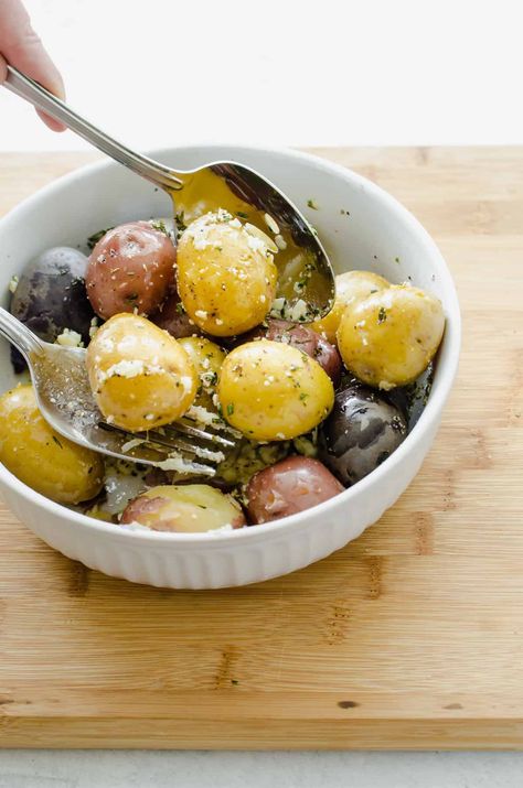 Boiled baby potatoes served in a white bowl with Parmesan and chopped parsley on top. Potatoes On The Stove, Baby Potato Salad, Boiled Baby Potatoes, Baby Potato Recipes, Salad Appetizer, Tomato Cucumber, Salad Ideas, White Potatoes, Baby Potatoes