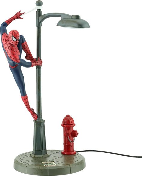 WATCH OUT: Here comes the Spider Man! Featuring Spidey perched on a street lamp and ready to spring into action, this Marvel-ous desk lamp is irresistible for kids and adults of the fandom! SPIDERMAN LAMP: A wonderful piece of Marvel Comics memorabilia, display in your room or office, or use as a night light on your bedside table. The streetlight lights up when the lamp is switched on. Spiderman Lamp, Spiderman Room, Ultimate Spider Man, Hello Kitty House, Marvel Collectibles, Wonder Woman Logo, Batman Beyond, Man Room, Millennium Falcon