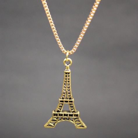 Capture the romance of Paris with our exquisite Eiffel Tower necklace, a timeless symbol of love and elegance.✨ .. . . . #EiffelTowerNecklace #ParisianChic #RomanticJewellery #SymbolOfLove #FashionEssentials #StatementPiece #JewelleryAddict #ElegantDesigns #FrenchStyle #ChicAndStylish Eiffel Tower Necklace, Timeless Symbol, Symbol Of Love, Romantic Jewellery, Parisian Chic, July 1, Love Symbols, Fashion Essentials, Statement Pieces