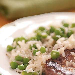 Parmesan Peas 'n' Rice Recipe -Parmesan Peas ’n’ Rice are a wonderful complement for any meal. My husband, John,  likes rice but isn’t crazy about peas, and I’m just the opposite. It's a great compromise! Rice And Green Peas Recipe, Parmesan Peas, Cheap Appetizers, Rice Sides, Buttery Rice, Pan Seared Pork Chops, Minute Steaks, Bean Dishes, Batch Recipes