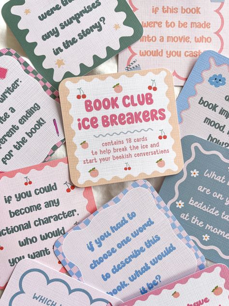 🎀 The book club ice breaker card set  Perfect for new book clubs! questions contain general bookish questions to get to know everyone, as well as discussion prompts! The cards:   This deck of cards contain 18 unique designs and question cards to help get your bookish discussions going! 💗 Cards are handmade and printed on luxury 300 gsm card stock.  Sizes are 9cm x 10cm approx 📬 Cards can be purchased with or without the wooden stand or mini wooden easel. We package the cards in a large letter Book Club Get To Know You, February Book Club Ideas, Book Club Retreat Ideas, Book Club Ice Breakers, Book Club Design, Bookclub Hosting Ideas, Book Club Crafts, Book Club Themes, Bookish Questions