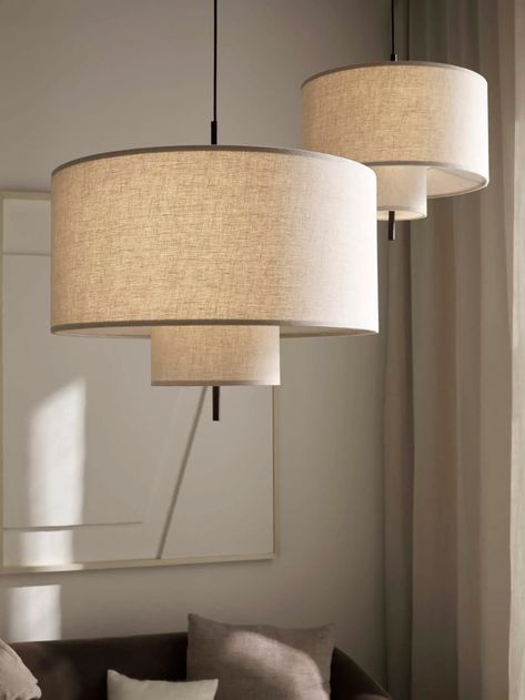 Contemporary linen pendant light shades | A light beige & white showroom makeover for New Works | These Four Walls blog Fabric Lantern, Linen Pendant, New Works, Fabric Lampshade, Design Studios, Cylinder Shape, Modern Fabric, Fabric Shades, New Words