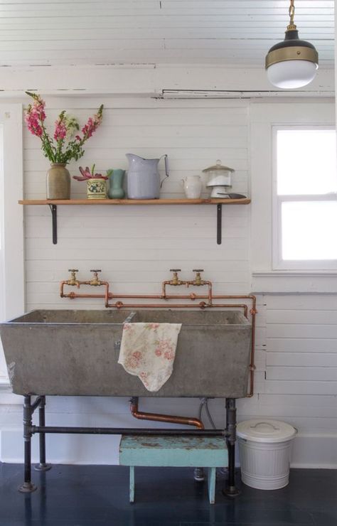 vintage stone sink in laundry room with exposed copper plumbing Cleaning White Walls, Vintage Laundry Room Decor, Vintage Laundry Room, Basement Laundry Room, Basement Laundry, Laundry Room Sink, Laundry Tubs, Farmhouse Laundry Room, Concrete Sink