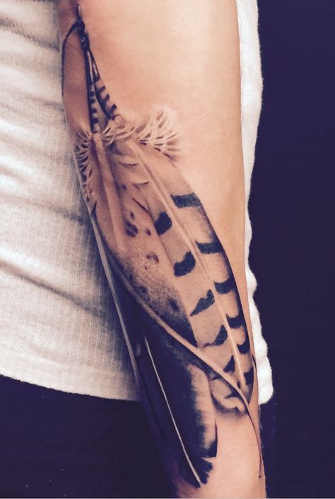 Feather Tattoo Sleeve For Women, Feather Band Tattoo, Indian Feather Tattoos Men, Forearm Feather Tattoo, Mens Feather Tattoo, Native American Hawk Tattoo, Men Feather Tattoo, Pheasant Feather Tattoo, Cardinal Feathers