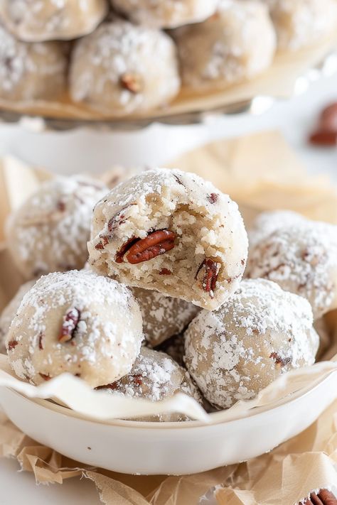 Christmas is nearly upon us, and to celebrate, I’m excited to share one of our cherished treats: butter pecan snowball cookies! These cookies are a simple yet classic addition to your holiday baking lineup, perfect for whipping up at the last minute. Made with pecans, they boast a delightfully shortbread-like texture that we absolutely adore. Healthy Snowball Cookies, Pecan Butter Balls Recipe, Butter Pecan Snowballs, Pecan Drop Cookies, Italian Pecan Cookies, Buttery Pecan Snowball Cookies Recipe, Almond Pecan Cookies, Christmas Nut Cookies, Pecan Puffs Cookies