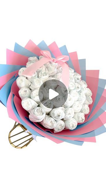 @manos.potosinas on Instagram: "A great & affordable gift to make 🌸🍼  • • • #babygift #babygiftideas #diy #dollartreecrafts #diaperbouquet #babyshowerideas #babyshower #austintx #florist #atxflorist #austinflorist" Diaper Roses How To Make, Gender Reveal Bouquet Flowers, Baby Bouquet Diy Gift, Baby Shower Bouquet Ideas, Diaper Bouquet Diy, Diaper Bouquet Tutorial, Bouquet Diy Gift, Baby Shower Bouquet, Baby Sock Bouquet