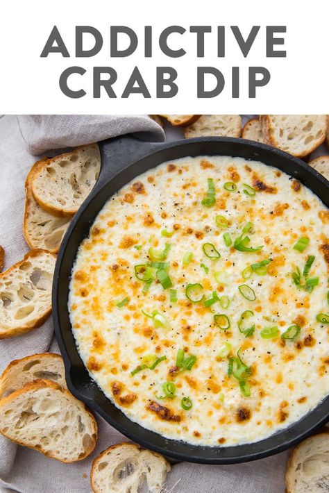 This crab dip is truly addictive! It's a super easy and ultra delicious, rich and creamy appetizer made with crab, green onions, cream cheese, mayo, and cheese. Served with crackers, chips, or bread for the best tailgating, holiday, or party dish. Low carb, keto, gluten free. #appetizer #dip #tailgating #entertaining #keto Warm Crab Dip, Baked Crab Dip, Creamy Crab Dip, 40 Aprons, Best Christmas Appetizers, Hot Crab Dip, Creamy Crab, Gluten Free Appetizers, Christmas Recipes Appetizers