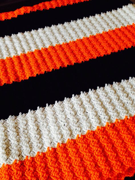 Slanty Shell Crochet Blanket in Orange, White, and Black Black And White Crochet Blanket, Shell Crochet Blanket, Black Crochet Blanket, White Crochet Blanket, Blue Crochet Blanket, Black And White Crochet, Shell Crochet, Striped Crochet Blanket, Blanket Craft