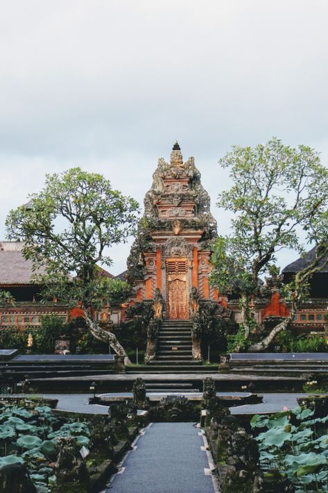 An itinerary to Bali is incomplete without a stopover at Ubud Palace, located right on the main Jalan Raya Ubud road. Built in the 19th century by the ruler Ida Tjokorda Putu Kandel, the palace's front section with its gardens and carvings is a visual delight, while international events on art, music and literature are held inside, making this place a cultural repository of Ubud. Ubud Palace, Ubud, Art Music, Ruler, Stuff To Do, 19th Century, Palace, Bucket List, Bali