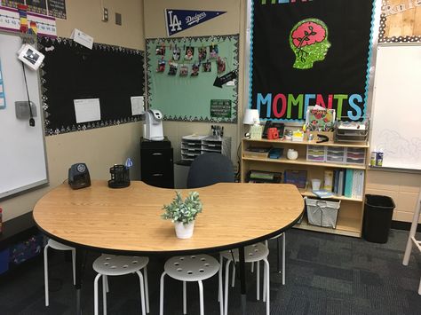 I traded out my teacher desk in favor of a group table. www.therusticteacher.blogspot.com Small Group Desk Arrangement, Teacher Desk Kidney Table, Small Group Table As Teacher Desk, Kidney Table As Teacher Desk, Horseshoe Table As Teacher Desk, Teacher Area And Small Group Table, Teacher Table Desk, Kidney Table Classroom Setup, Shared Classroom Setup Teachers