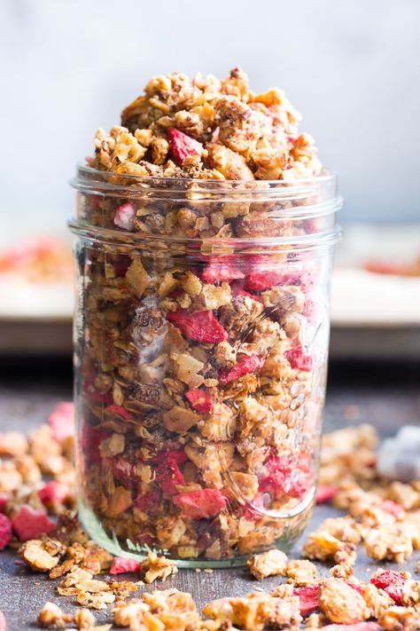 This crunchy grain free granola is packed with toasty sweet clusters and freeze dried strawberries for a breakfast or snack that you won't believe is actually good for you!  It's paleo, vegan, free of refined sugar and family approved! Granola With Dried Fruit, Recipes With Freeze Dried Strawberries, Fruit Granola Bars, Paleo Granola Recipe, Paleo Breakfasts, Paleo Running Momma, Strawberry Granola, Whole30 Diet, Homemade Cereal