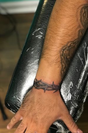 Tattoo uploaded by Roger Picasso Hora • Thorns on wrist tattoo! • Tattoodo Wrist Thorn Tattoo, Crown Of Thorns Tattoo Around Wrist, Thorns Band Tattoo, Thorn Ring Tattoo, Thorns Around Wrist Tattoo, Thorn Wrist Tattoo Men, Best Looking Tattoos For Men, Christian Spine Tattoo Men, Ring Of Thorns Tattoo