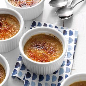 Rum Raisin Creme Brulee Recipe: How to Make It | Taste of Home Turkey Roasting Pan, Creme Brulee Recipe, Brulee Recipe, Caramelized Sugar, Roasting Pan, Vanilla Flavoring, Washington Post, Food Network, Caramel Apples