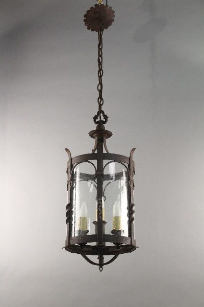 Wrought iron pendant with glass with three  lights.  Original finish.  27.5" H x 13.25" W x 13.25" D x 46.5" Total H with chain & canopy Spanish Colonial Pendant Light, Wrought Iron Pendant Light, Spanish Lighting, Monterey Furniture, Spanish Revival Home, Iron Pendant Light, Colonial Furniture, Glass Barn Doors, Iron Lanterns