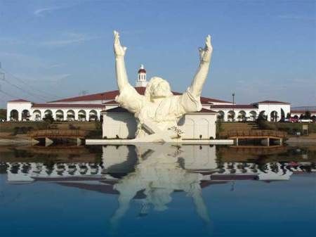 The formerly famous (locally and then nationally) and extremely hideously and (to many of us) tacky statue outside Solid Rock Church north of Cincinnati known as "Touchdown Jesus" that was struck directly by lightning and destroyed on 6/15/10. It made national news and was the subject of a lot of hilarity locally (and nationally. Touchdown Jesus, Ridiculous Pictures, Roadside Attractions, Cincinnati Ohio, King Of Kings, Hug Me, Cincinnati, Statue Of Liberty, Ohio