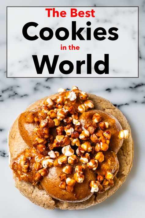 Pinterest image: photo of a buckwheat cookie with caption reading "The Best Cookies in the World" Worlds Best Dessert, Famous Cookies, Cookies Around The World, Baked Goods From Around The World, Unique Cookie Flavor Combinations, Amazing Cookies Recipes, International Cookies Around The Worlds, Tall Cookies, Christmas Cookies Unique