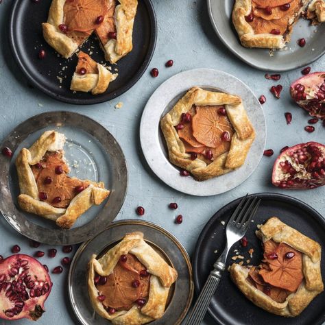 A hidden layer of chocolate takes these fruity galettes up a notch. Mini Persimmon Galettes   Save Recipe Print Yields: 6 (4-Inch) Galettes Ingredients 1 tablespoon sugar, plus more for sprinkling ½ teaspoon kosher salt ½ teaspoon apple pie spice 2 cups thinly sliced Fuyu persimmons Tart Dough (recipe follows) ½ cup finely chopped semisweet … Persimmon Galette, Tart Dough Recipe, Tart Dough, Mini Pie, Spiced Chocolate, Apple Pie Spice, Snack Attack, Mini Pies, Pies & Tarts