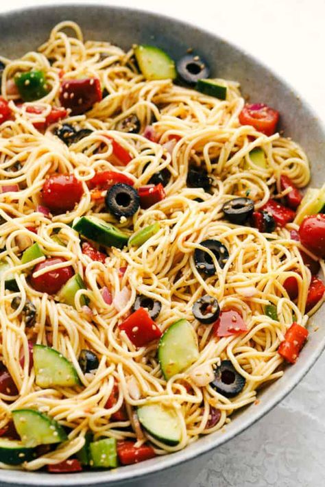 Delicious California Spaghetti Salad in a Zesty Italian Dressing - TASTYDONE Spagetti Salad Recipes, California Spaghetti Salad Recipe, California Spaghetti Salad, California Pasta, California Spaghetti, Cold Spaghetti Salad, Spaghetti Pasta Salad, Delicious Spaghetti, Spaghetti Salad