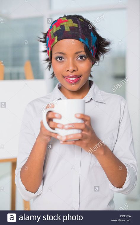 Download this stock image: Artistic woman holding cup of coffee - DPEY5A from Alamy's library of millions of high resolution stock photos, illustrations and vectors. Hold Cup Reference, Holding A Coffee Cup Pose, Person Holding Coffee Reference, Holding Coffee Reference, Holding Cup Pose Reference, Person Holding Mug Reference, Person Holding Cup Reference, Hands Cupping Face Reference, Holding A Teacup Reference