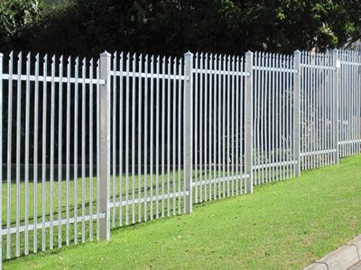 White steel palisade fence in ladder type, installed on the grass land, the… Palisade Fence, Metal Fence Posts, Welding Design, Safety Fence, White Fence, Metal Gates, Fencing & Gates, Types Of Fences, Garden Screening