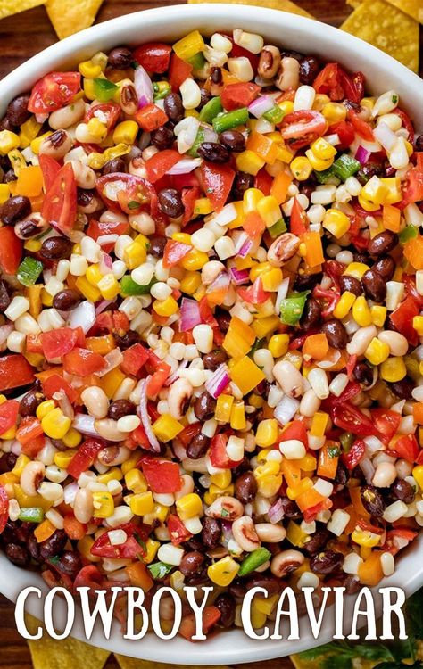 Overhead image of a large white bowl filled with fresh diced vegetables, including various peppers, white corn, yellow corn, black eyed peas, black beans, red onion, and tomatoes. Italian Vinaigrette Dressing, Texas Caviar Recipe, Italian Vinaigrette, Texas Caviar, Caviar Recipes, Vegetable Plate, Cowboy Caviar, Chicken Thigh Recipes Crockpot, Lake Food Ideas