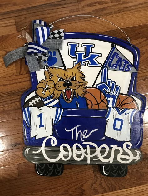 I painted this team truck door hanger with a Kentucky wildcat theme.... University Of Kentucky Door Hanger, Kentucky Door Hanger, Kentucky Christmas, Truck Door Hanger, School Door Decorations, Wooden Ideas, Ky Wildcats, Door Hanger Ideas, Burlap Door Hangers