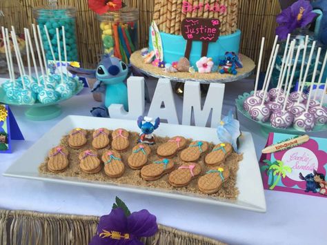 Lilo and Stitch Inspired Hawaiian Luau | CatchMyParty.com Lilo And Stitch Graduation Party, Stitch Dessert Ideas, Lilo And Stitch Pretzel Rods, Stitch Girl Birthday Party, Lilo And Stitch 1st Birthday Party Girl, Lilo And Stitch Food Ideas, Stich Party Ideas Girl, Lili And Stitch Birthday Party Decor, Lilo And Stitch Baby Shower Ideas