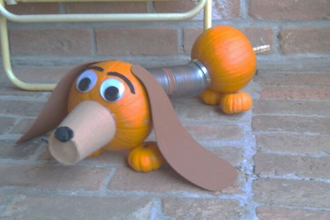 Slinky dog pumpkin Slinky Dog Pumpkin, Disney Pumpkin Painting, Book Character Pumpkins, Story Book Pumpkin, Toy Story Halloween, Creative Pumpkin Painting, Character Pumpkins, Slinky Dog, Creative Pumpkin Decorating