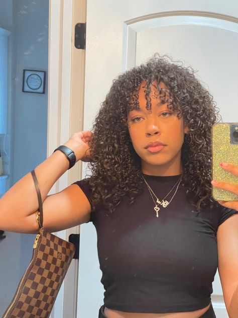 Biracial Hair With Bangs, Fringe Bangs Curly Hair Natural Curls, Curtain Bangs Coily Hair, Low Bun With Curly Bangs, 4c Bangs Hairstyles, 3b Curtain Bangs, Curly Hair Cuts Medium Length 3c, Whispy Front Bangs Curly Hair, Curly Hair Covering Eyes