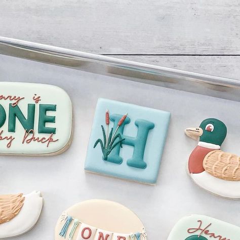 Audrey O’Shanna on Instagram: "This set/theme was so different and adorable, it immediately jumped to one of my all time favorites. 🦆1️⃣💙 . . #SugarCookies #DecoratedCookies #ShortbreadCookies #RoyalIcing #EdibleArt #Chicago #WindyCityCookies #ShopLocal #HomeBaker #SmallBusiness #ShopSmall #ChicagoCookies #ChicagoBaker #OneLuckyDuck #LuckyDuckCookies #BirthdayCookies #FirstBirthday" One Lucky Duck Cookies, One Lucky Duck, Duck Cookies, First Birthday Cookies, Duck Birthday, Lucky Duck, Icing Cookies, Edible Art, Cookie Designs