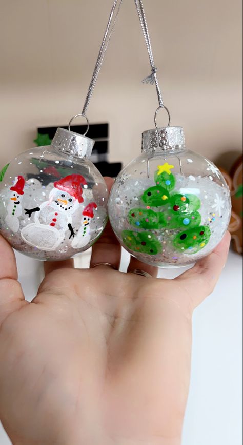 Snowman Fingerprint Ornament, Dinosaur Ornament Diy, Finger Print Ornaments For Kids, Thumbprint Ornaments For Kids, Fingerprint Ornaments Kids, Clear Ornament Crafts For Kids, Fingerprint Christmas Ornaments, Fingerprint Ornaments, Fingerprint Ornament