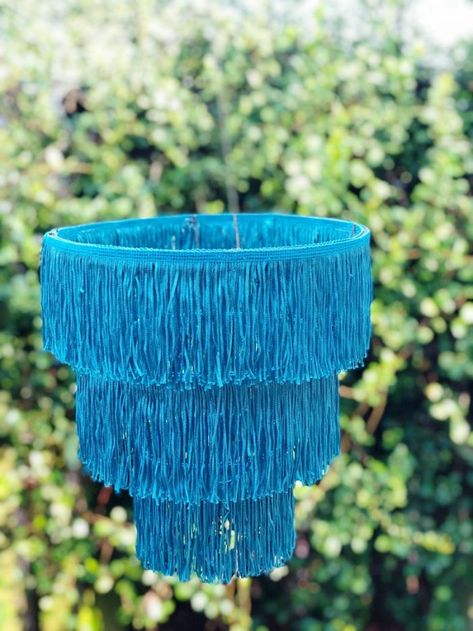 Trendy Fringe Chandelier DIY Tutorial - Creatively Beth Fringe Chandelier, Chandelier Diy, Trendy Fringe, Denim Pillow, Faux Cactus, Diy Chandelier, Beach Diy, Family Crafts, Fringe Trim