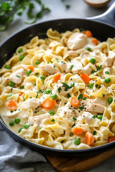 Transform traditional comfort food with the Chicken Pot Pie Noodle Skillet. This one-pan wonder mixes creamy, savory pot pie filling with hearty noodles, offering all the cozy flavors you love with a delightful twist. #ChickenPotPie #SkilletMeal #ComfortFood Chicken Pot Pie Skillet, Chicken Pot Pie Noodle Skillet, Pot Pie Noodles, Chicken Pot Pie Pasta, Skillet Food, Comforting Casseroles, Pot Pie Filling, Whole Roasted Chicken, Chicken Recipies