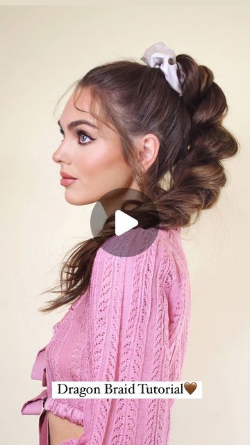 Jackie Wyers on Instagram: "🎀 The Dragon Braid: A Hair Tutorial🎀   What I’ve been calling a faux braid, or pull-through braid, has been renamed the dragon braid!🐉   I love the braid up high because it looks so fluffy and holds the volume so you can see it from straight on. Add with a big satin scrunchie or bow for a super cute look 🎀   I like my hairstyles a little messy and worn-in but it looks so nice polished too. & that’s how to do a dragon braid!   Wearing a thrifted bow sweater from @forloveandlemons   #dragonbraid #hair #hairtutorial #pullthroughbraid #hairstyles #tutorial #howto #dragonbraidtutorial #easyhairstyles #ponytail #ponytailbraids #ponytailtutorial #brunette" Dragon Braid Tutorials, Easy Pull Through Braid, Dragon Braid Hairstyles, Hair Braids Tutorials, Bow Braids, Faux Braid, Jackie Wyers, Dragon Braid, Feather Braid