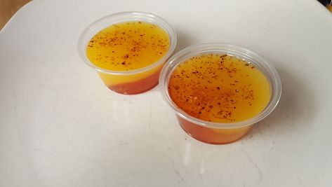 Mangonada Jell-O® Shots | Allrecipes Tajin Jello Shots, Chamoy Jello Shots, Mexican Jello Shots, Mexican Mangonada, Chamoy Shot Recipe, Jell O Shots Recipe, Chamoy And Tajin, Mangonada Recipe, Chamoy Sauce