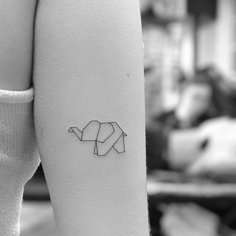 Origami Lion Tattoo, Origami Animal Tattoo, Origami Tattoo Ideas Geometric, Elephant Minimal Tattoo, Simplistic Elephant Tattoo, Mini Tattoos Elephant, Minimal Elephant Tattoo, Origami Tattoos, Origami Elephant Tattoo