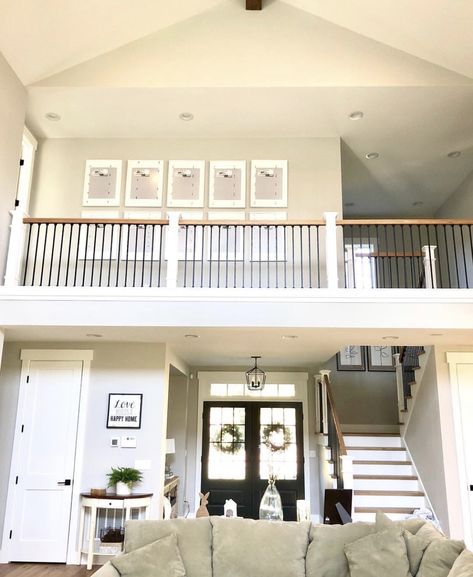 Two story living room view looking up. Second Story Overlooking Living Room, Living Room Open To Second Floor, Living Room Open To Upstairs, Upstairs Open To Below, Staircase Overlooking Living Room, Inside Balcony Living Rooms, Great Room Makeover, Master Bath Ideas Small Space, Modern Farmhouse Open Living Room