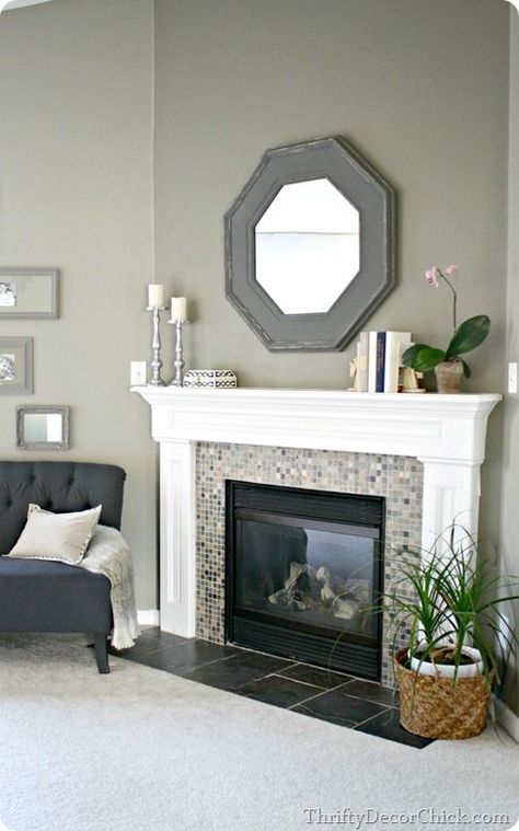 Paint color: Tornado Watch, Lowe's. Great sage green with blue-gray undertones. ~ Just love the fireplace look :) Decorate Mantel, Fireplace Redo, Thrifty Decor Chick, Fireplace Hearth, Corner Fireplace, Fireplace Remodel, Home Fireplace, Fireplace Makeover, Modern Fireplace