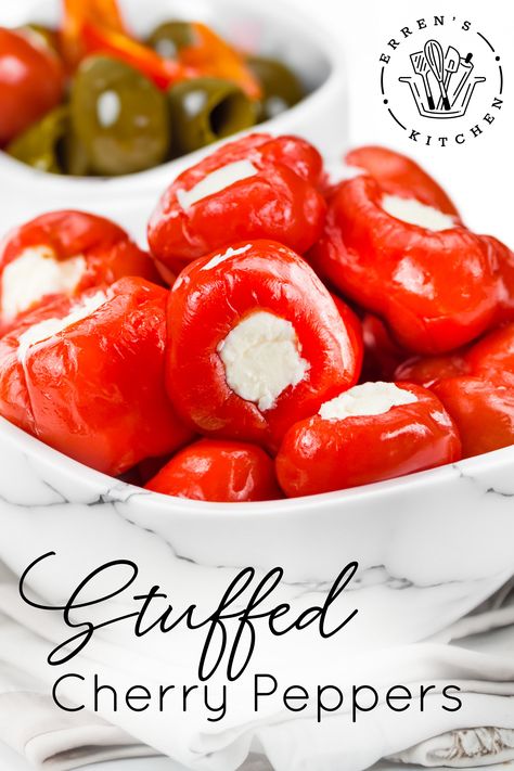 This easy, finger food recipe for Stuffed Cherry Peppers delivers a burst of creamy, tangy, and slightly spicy flavors. With rich cheeses, zesty garlic, and flavorful cherry peppers, it's an appetizer that's sure to impress!
Savor these Stuffed Cherry Peppers, packed with creamy cheeses for a flavorful, easy, and impressive appetizer suitable for any occasion or party such as Thanksgiving, Super Bowl, movie night snack, and more!

Stop at errenskitchen.com for easy, delicious recipes! Pepper Shooters Stuffed, Stuffed Cherry Peppers, Cherry Pepper Recipes, Cherry Bomb Pepper, Easy Finger Food, Cherry Peppers, Impressive Appetizers, Pepper Recipes, Appetizers Easy Finger Food