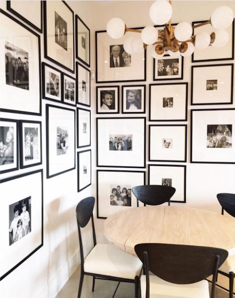 This gallery wall—or rather gallery corner—wraps around two walls and features treasured family photos in similar black frames with white mats. What a beautiful way to display these memories. Corner Gallery Wall, Family Photo Gallery Wall, Photo Wall Display, Family Photo Wall, Photo Wall Gallery, Gallery Wall Inspiration, Gallery Wall Living Room, Inspiration Wall, Style At Home