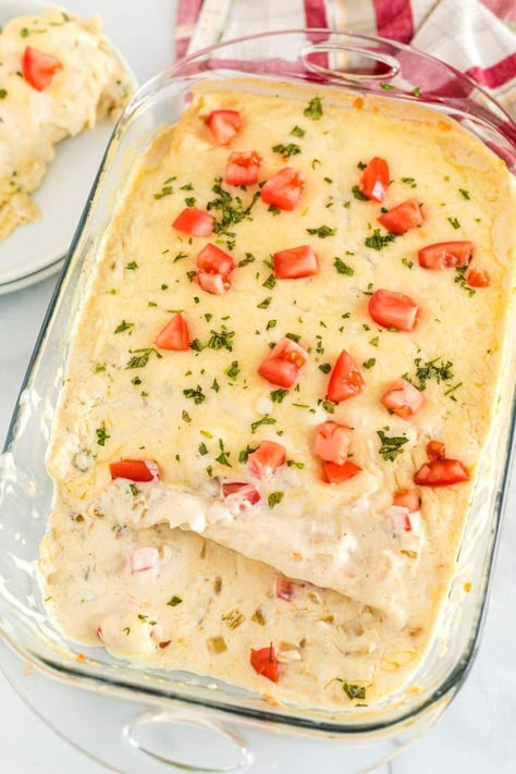 This Chicken Enchilada recipe is some serious comfort food! The enchiladas are filled with chicken, cheese, corn, and covered with green chile cream sauce. Green Chili Cream Sauce, Green Chile Cornbread, Baked Boneless Chicken Breast, Posole Recipe, Chicken Enchilada Casserole Recipe, Green Chile Chicken Enchiladas, Cream Sauce Recipe, Enchilada Casserole Recipes, Main Course Meals