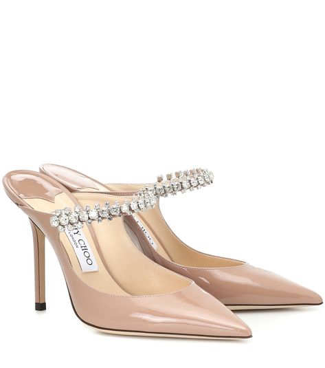 Jimmy Choo - Bing 100 patent leather mules - These dusty-pink Bing Mules from Jimmy Choo are an undeniably feminine style with statement-making appeal. Crafted in Italy from patent leather, they’re cut to a point-toe silhouette with crystal-embellished straps, then set on 100mm stiletto heels. Team yours with a graphic T-shirt and mini skirt for a free-spirited day-to-dark look. seen @ www.mytheresa.com Jimmy Choo Bing, Jimmy Choos, Noble Lady, Jimmy Choo Heels, Wedding Dress Shoes, Satin Pumps, Fashion Heels, Patent Leather Pumps, Jimmy Choo Shoes