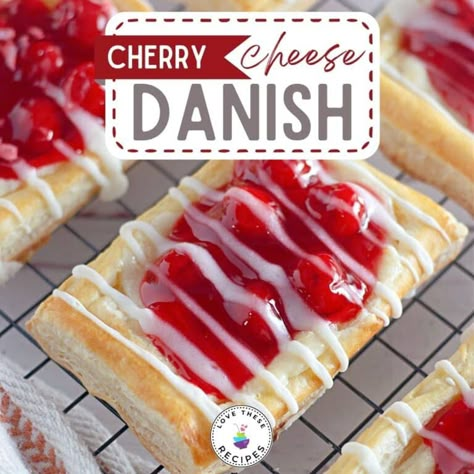 This delightful cherry cheese Danish combines flaky layers of frozen puff pastry with a luscious cream cheese filling and a burst of juicy cherry flavor. Puff Pastry Cherry Cream Cheese Danish, Cherry Cheesecake Puff Pastry, Cherry Puff Pastry Dessert, Butter Cocktail, Cherry Cream Cheese Danish, Cherry Danish Recipe, Cherry Cheese Danish, Cherry Danish, Cream Puffs Easy