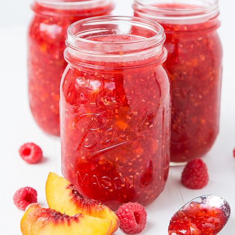 Bottle up the summer with this easy Raspberry Peach Freezer Jam! You'll never go back to store-bought after you try this. Peach Freezer Jam, Refrigerator Jam, Freezer Jam Recipes, Jam Recipes Homemade, Canning Jam, Freezer Jam, Homemade Food Gifts, Jam And Jelly, Jam Recipe